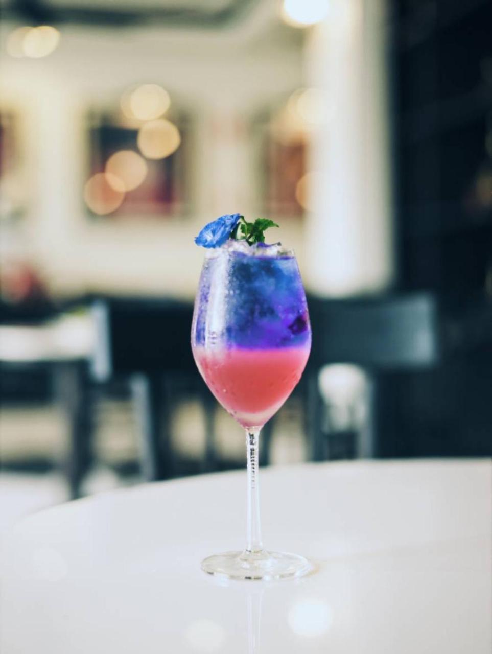 Mora Boutique Hotel - Sha Extra Plus Chiang Rai Exterior photo A blue butterfly pea flower cocktail