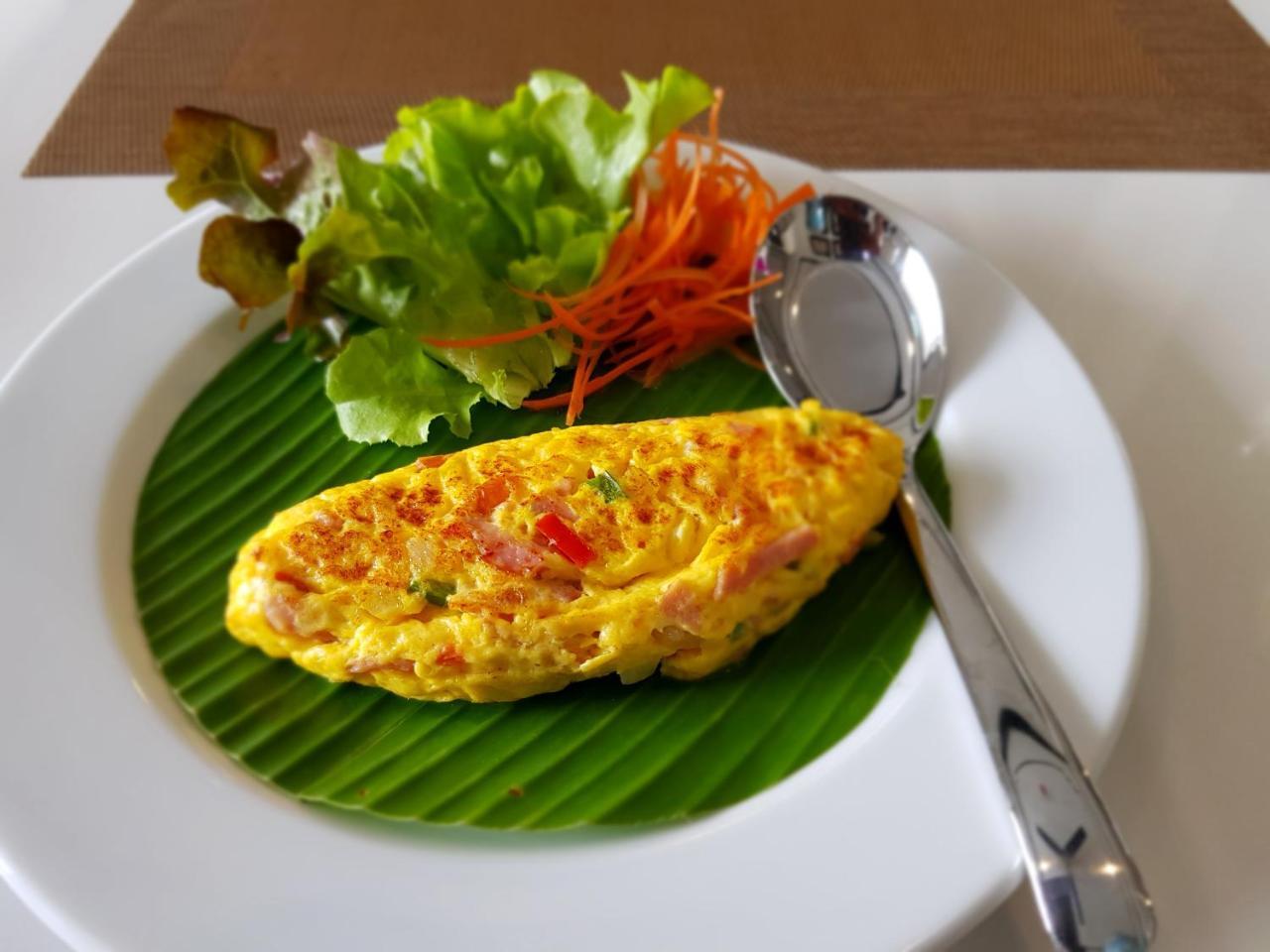 Mora Boutique Hotel - Sha Extra Plus Chiang Rai Exterior photo Thai omelette