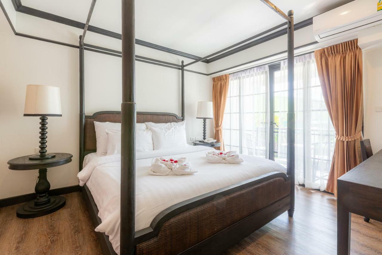 Mora Boutique Hotel - Sha Extra Plus Chiang Rai Exterior photo A four-poster bed