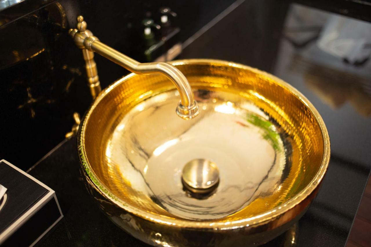 Mora Boutique Hotel - Sha Extra Plus Chiang Rai Exterior photo A gold-plated sink